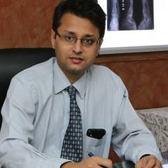 Dr. Mandar V. Agashe